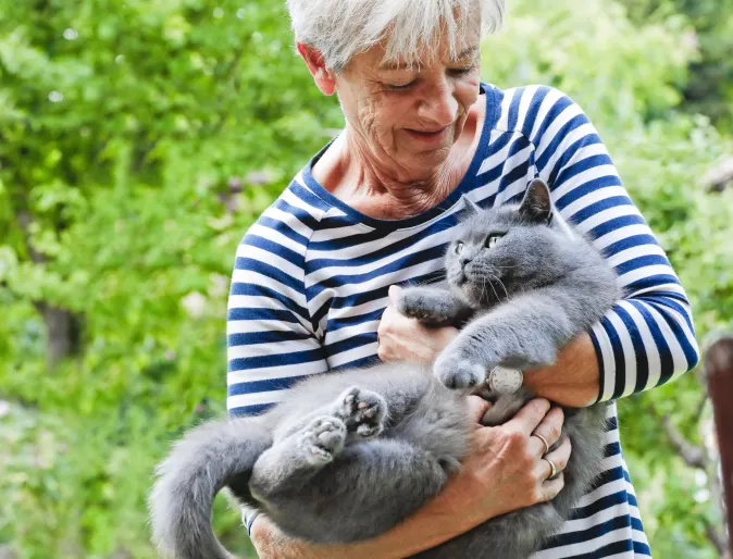 Old lady holding cat